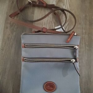 3 pocket Dooney and bourk luxur crossbody shoulder bag